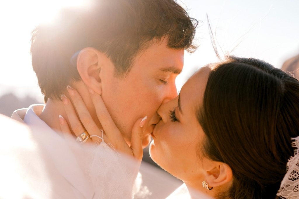Newlywed couple wearing wedding bands from Myranda Fine Jewelry