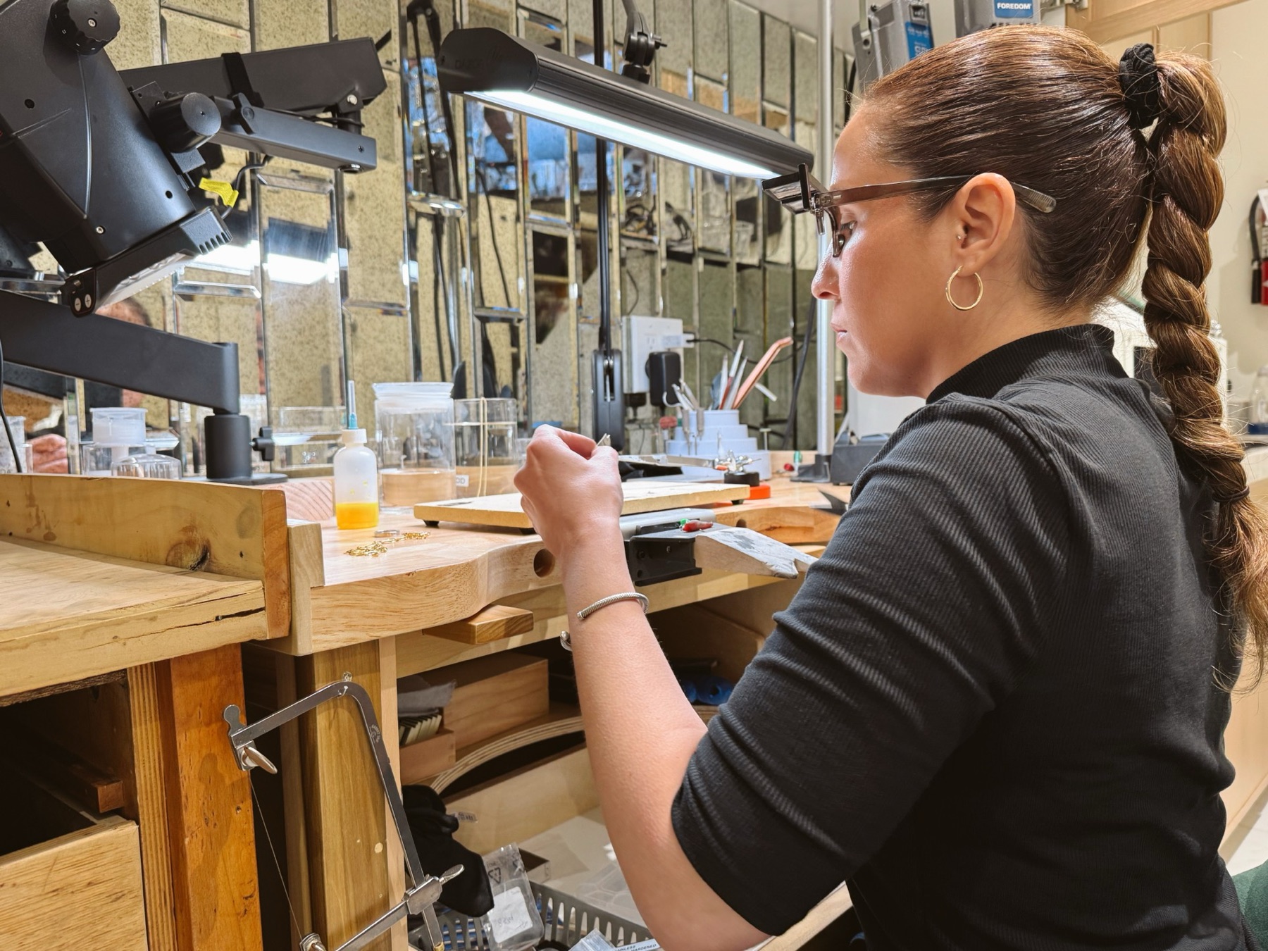 Jeweler repairing fine jewelry at Myranda Fine Jewelry
